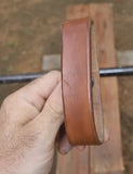 Leather strap retainer